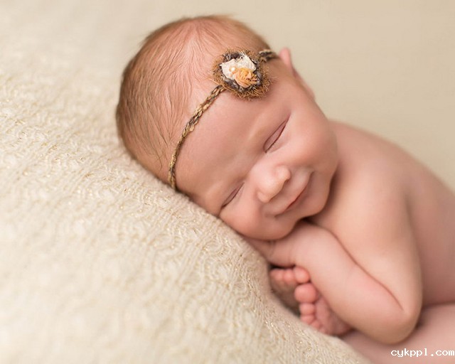 拍摄小技巧：如何让熟睡的婴儿微笑